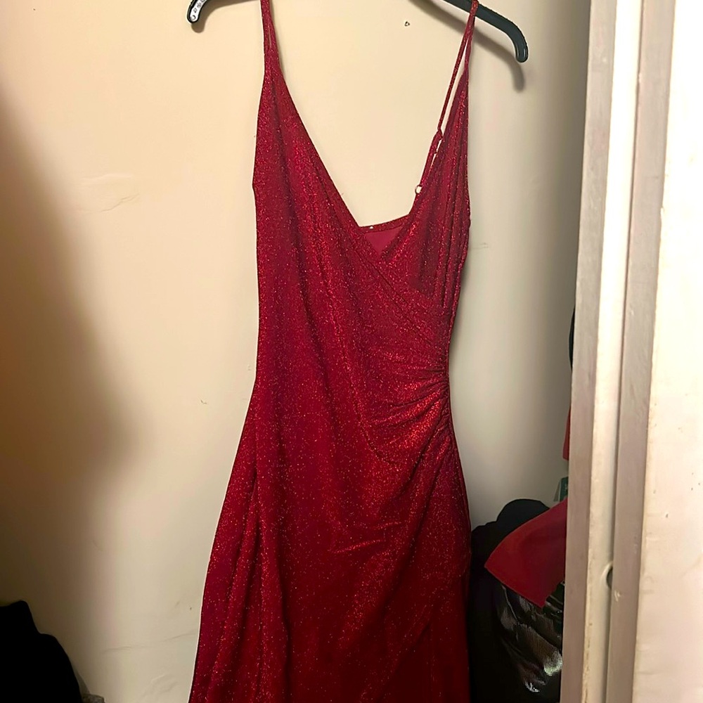 Red dress with leg slit, inside of dress is somewhat itchy